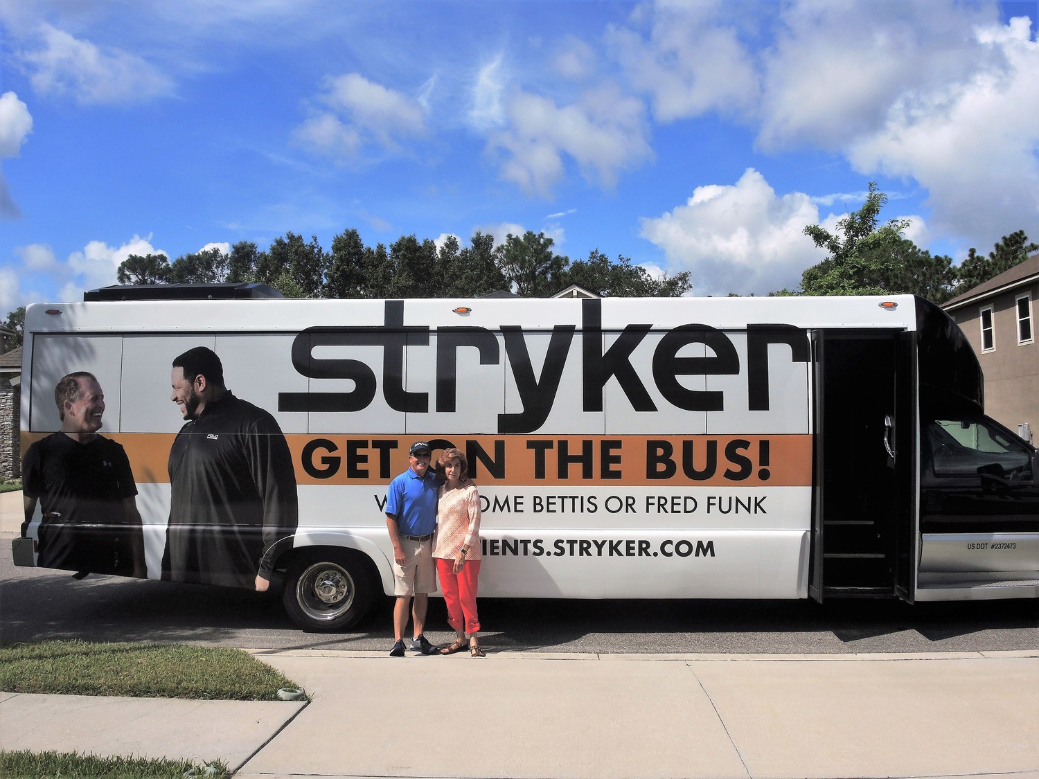 PGA Tour Champions golfer and Ponte Vedra Beach resident Fred Funk stands alongside Carol Simpson, who was the winner of Stryker’s “Get on the Bus” contest in Jacksonville.